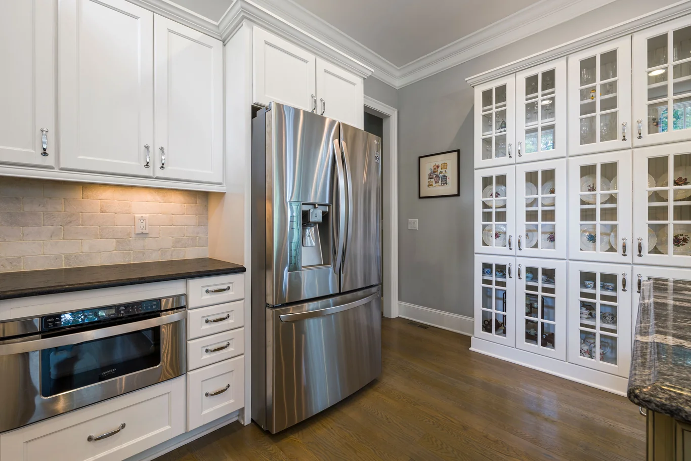 Modern kitchen with a stainless steel french door refrigerator