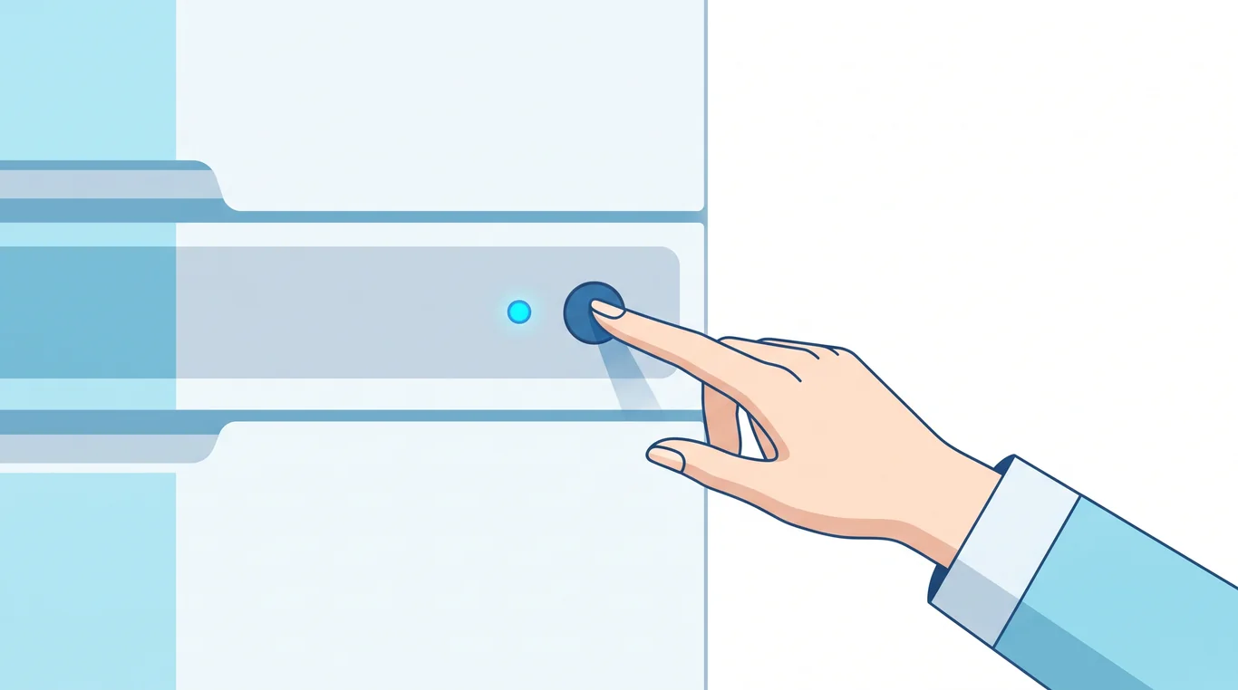 Hand holding a reset button beside a refrigerator indicator light